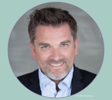 Porträtbild Lars Nicolaisen, Mann mit Hemd und Jacket